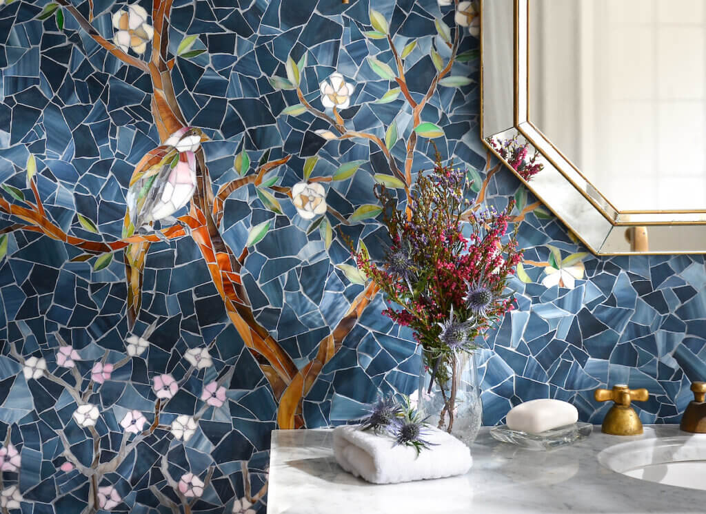 Glass and polished marble mosaic tiles create eye catching designs