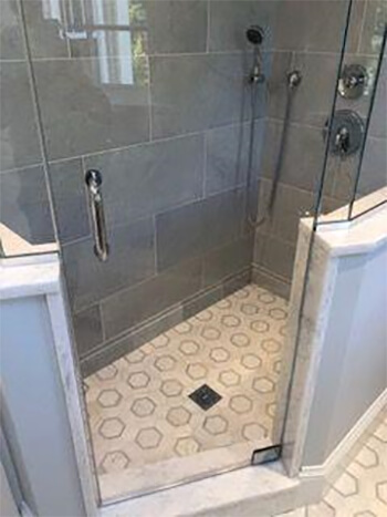 Porus stone tile in a bathroom shower