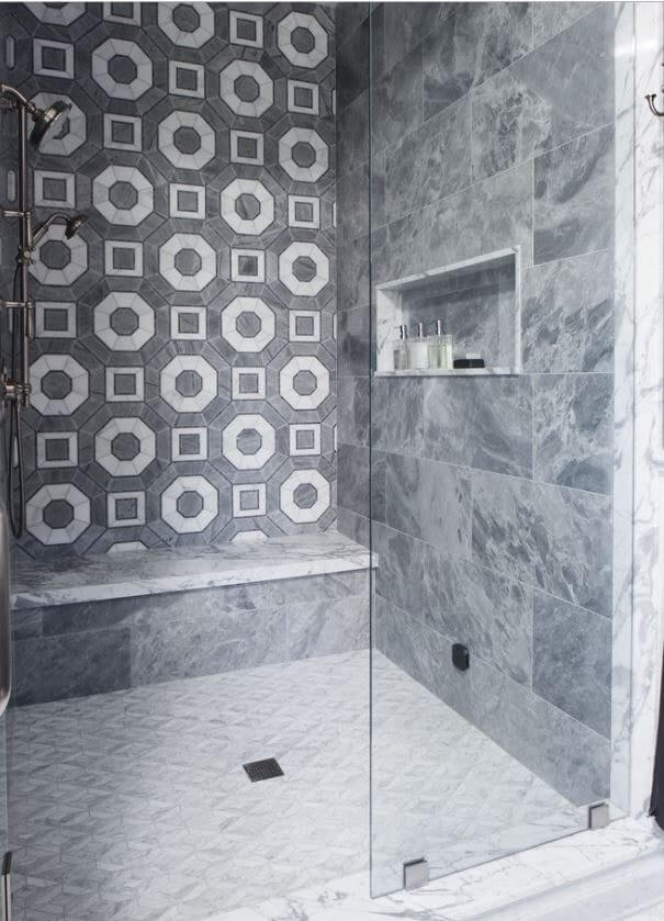 A stunning shower with natural stone tiles